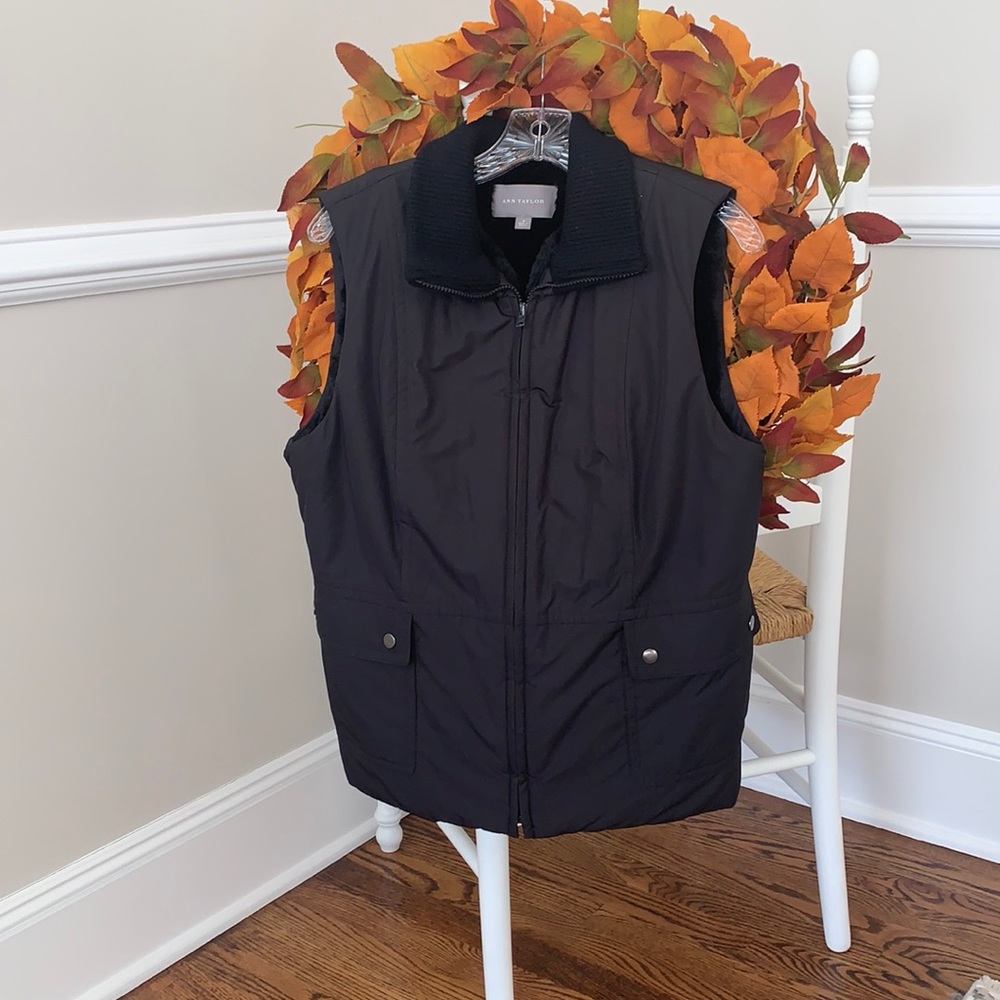Ann Taylor zipped vest in black, size medium.